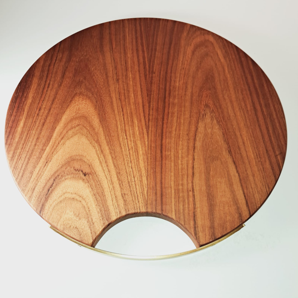 round kiaat serving board with solid brass handle